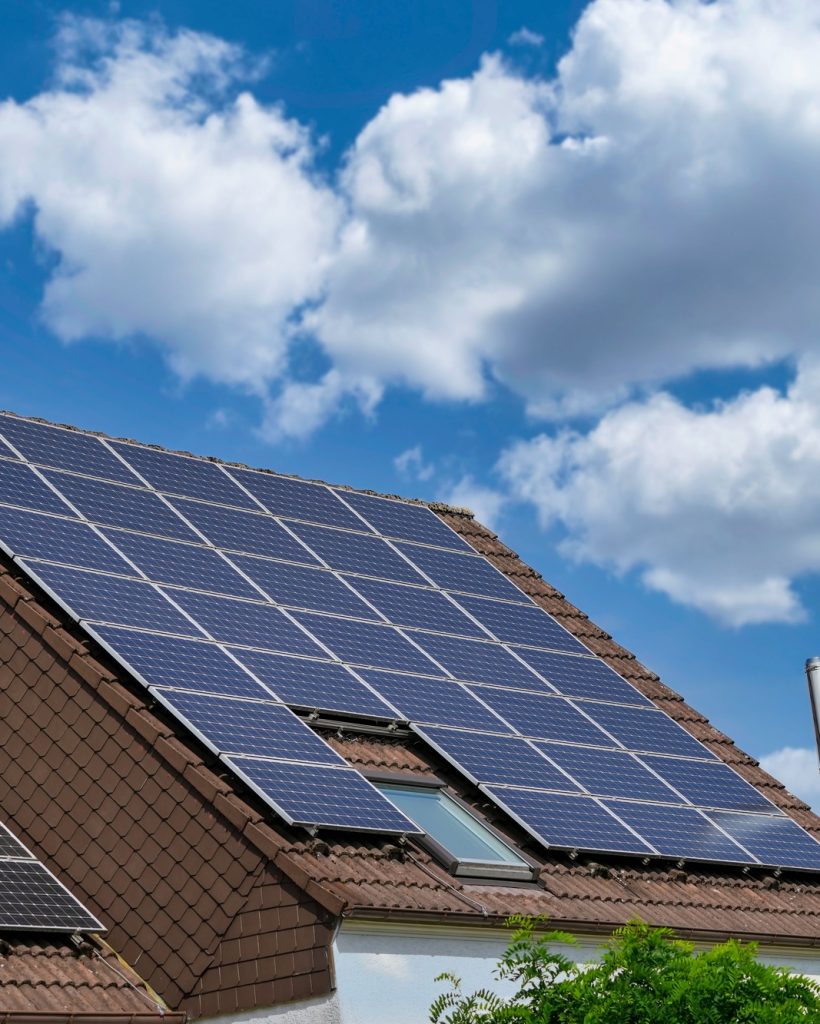 View of solar panels installed on a house roof